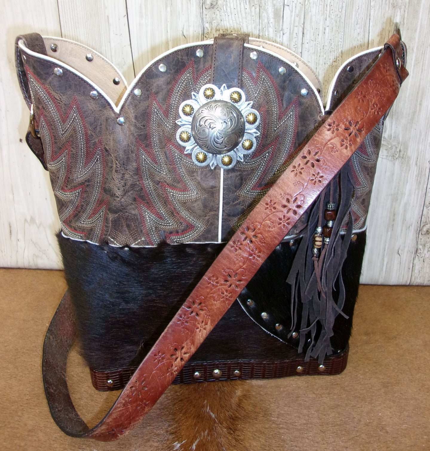 Top Shelf Cowboy Boot Purse with Fringe TS301 handcrafted from cowboy boots. Shop Handbags at ChrisThompsonBags.com and buy the best boot top purse, Country Chic, country fashion, country style, cowboy boot lover, cowboy boot purse, Cowgirl Chic, cowgirl style, luxury handbag, rodeo purse, western chic, western fashion, western style at Chris Thompson Bags.